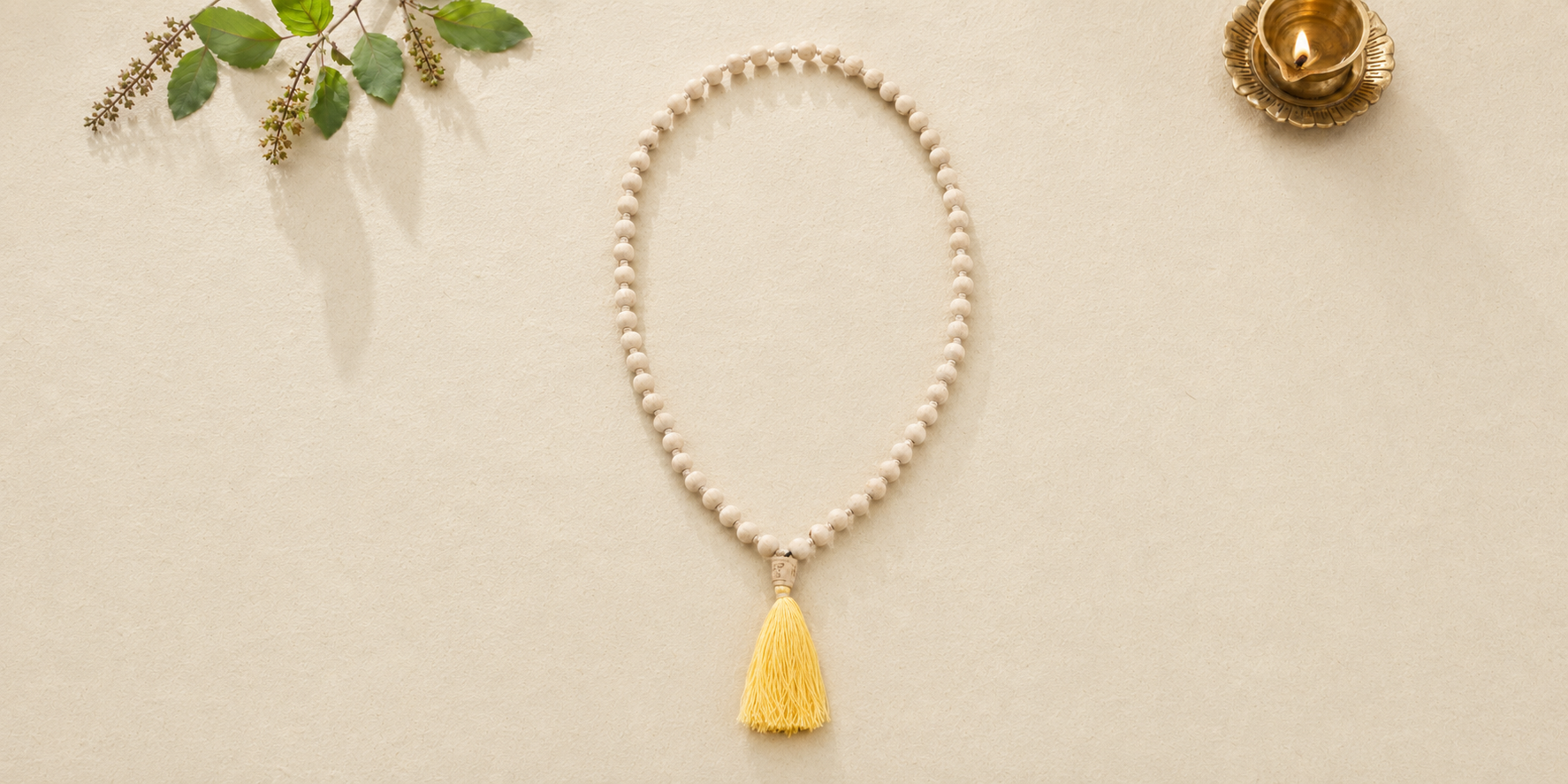 Handcrafted Tulsi Japa Mala with natural wood beads and yellow tassel