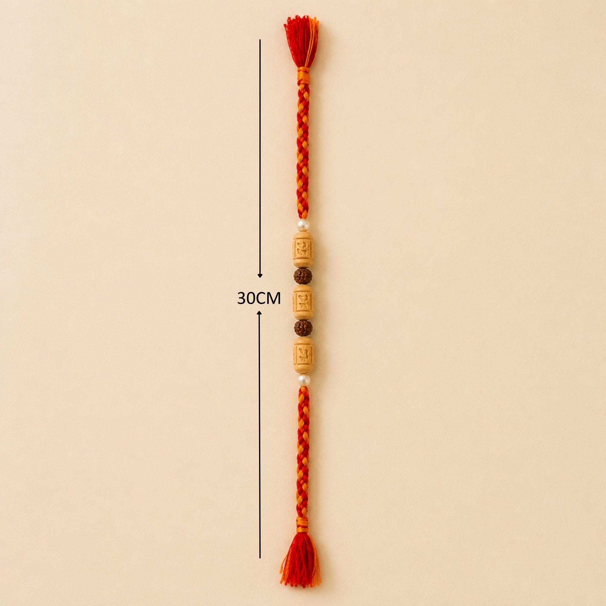 30 cm handcrafted Tulsi Rudraksha Rakhi thread with red and orange tassels