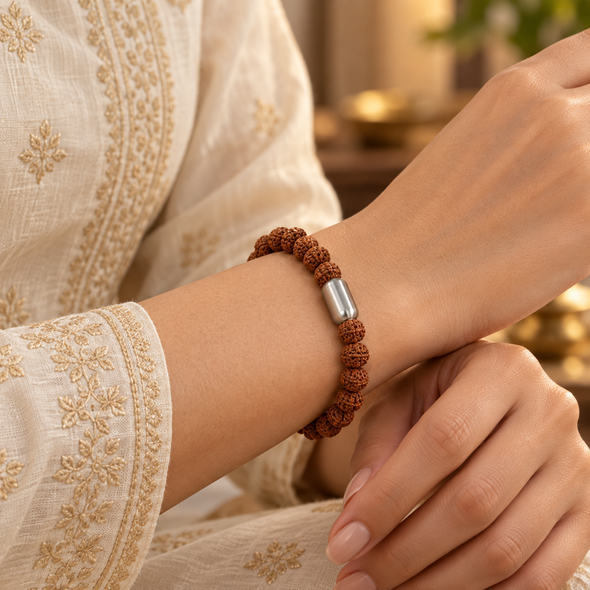 Authentic 6 Mukhi Rudraksha bracelet featuring a silver magnetic clasp for easy wearing