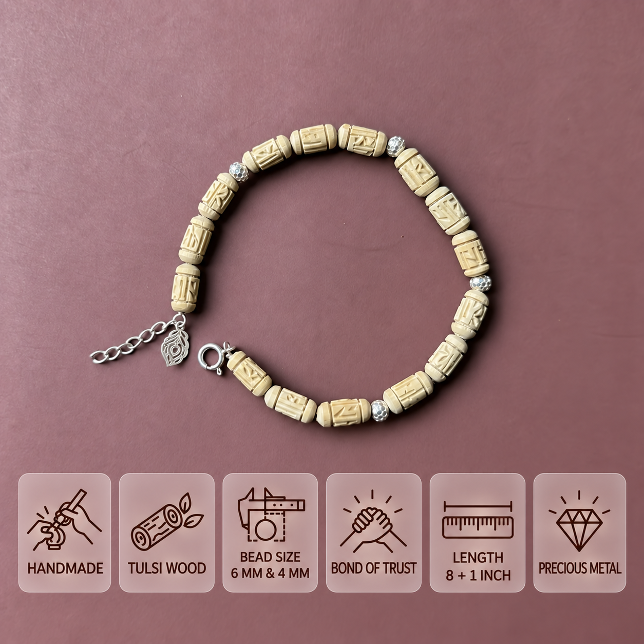 Carved Tulsi bead bracelet with silver-toned spacers, charm and extension chain, showing 6 mm and 4 mm beads and an 8 + 1 inch length.