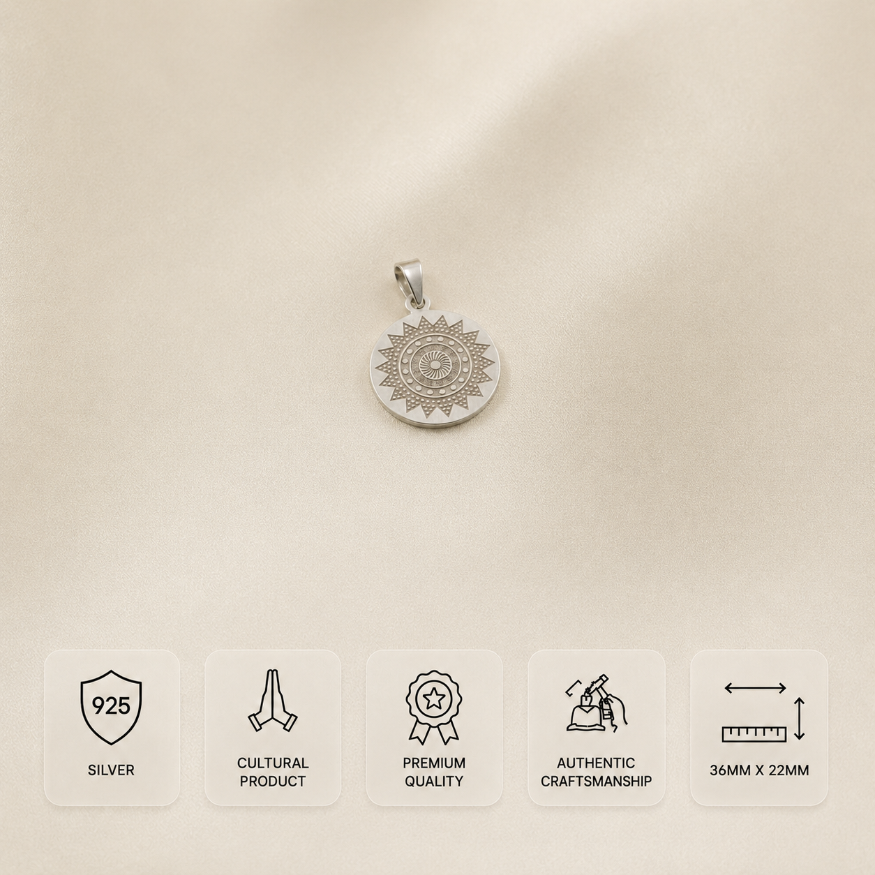 925 silver round chakra design pendant measuring 36 x 22 mm on a smooth ivory satin background