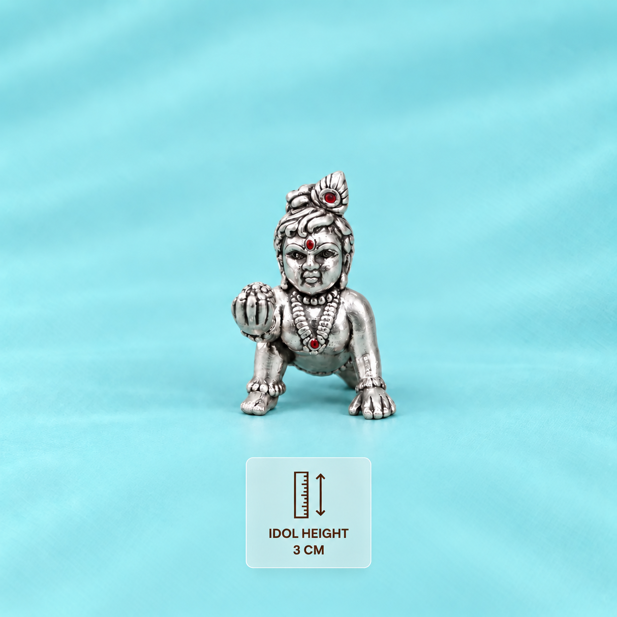 Front view of a silver crawling Laddu Gopal idol holding a sweet, with an idol height card showing 3 cm.