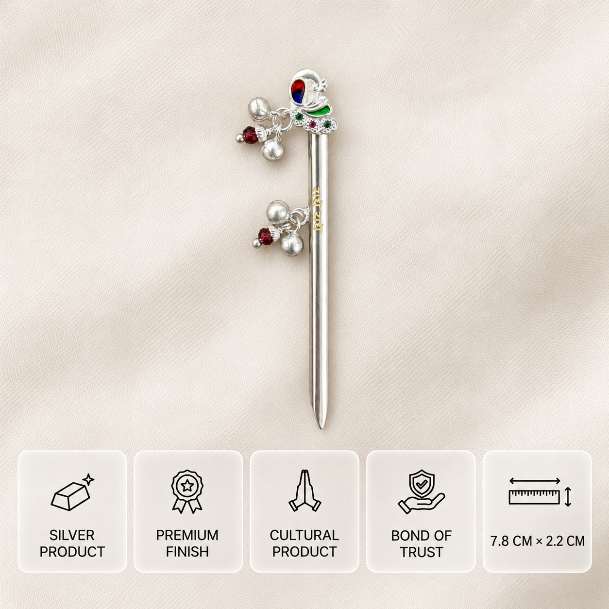 Silver Radhe Radhe flute with a colourful peacock design, red beads and bells, measuring 7.8 × 2.2 cm.