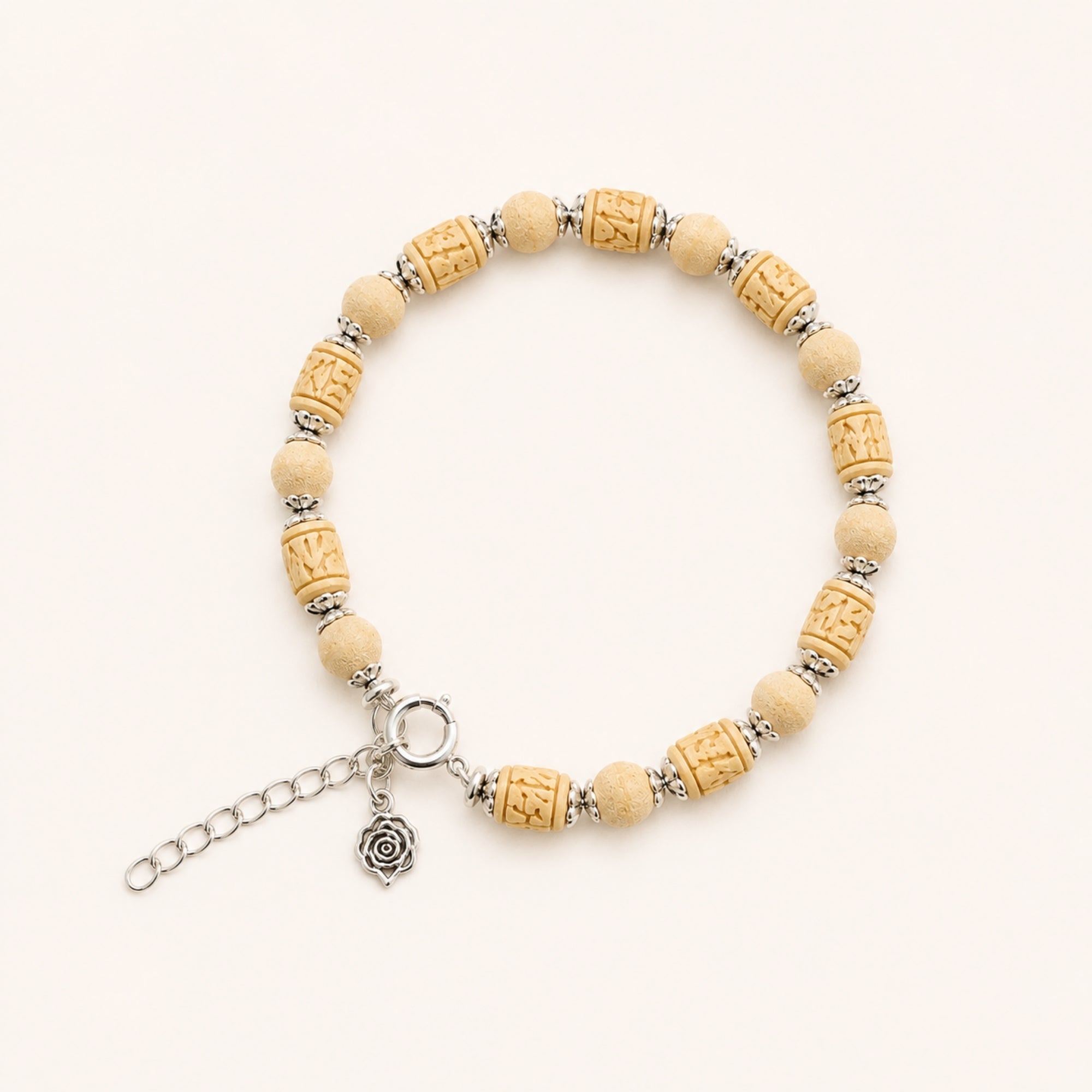 Close up flat lay of a 925 pure silver bracelet featuring authentic Tulsi wood beads with silver caps