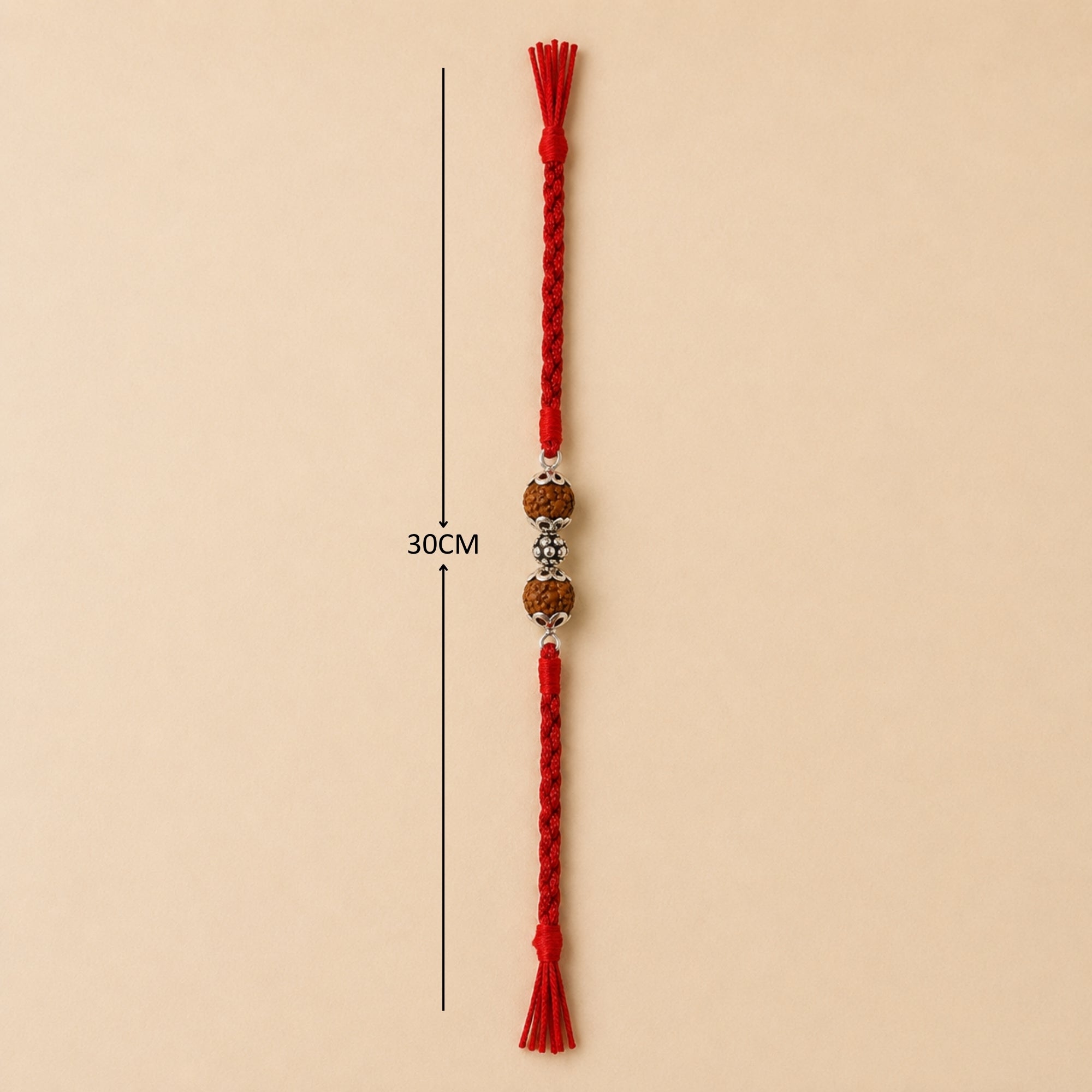 Full length layout showing red thread length and dimensions of 925 Chandi silver Rudraksha rakhi