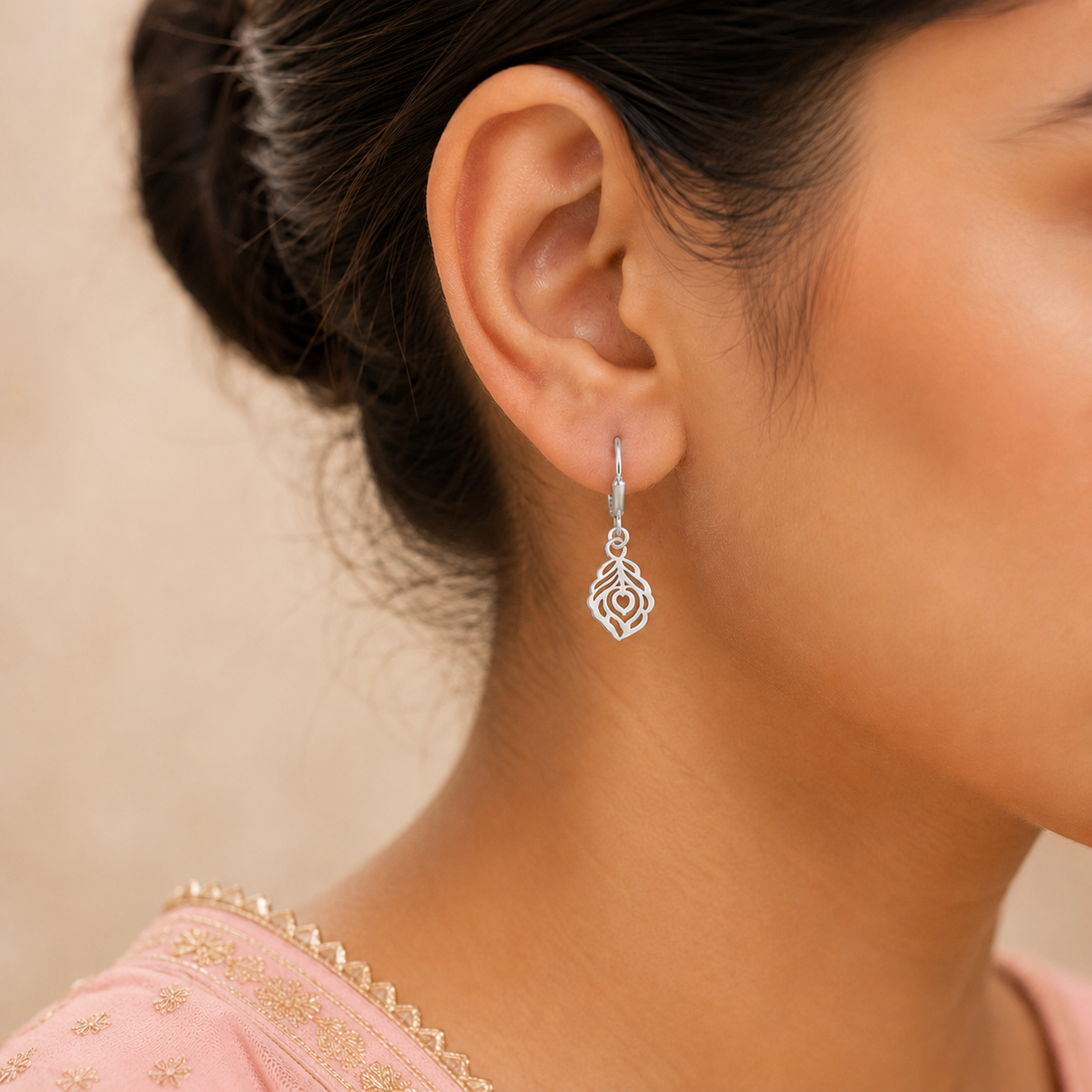 Model wearing 925 pure silver Mor Pankh peacock feather lever back earrings for women