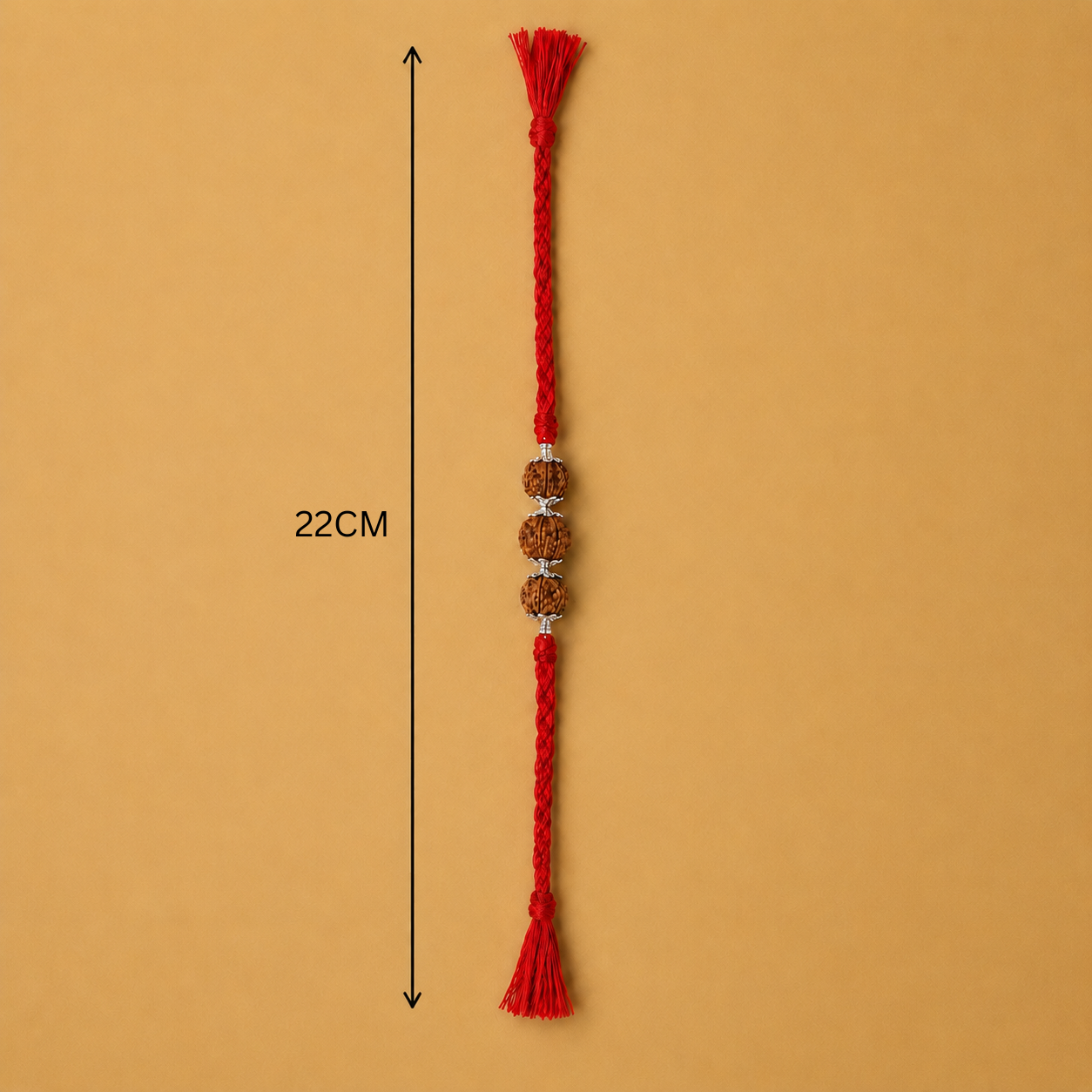Full length layout showing 22cm thread length and dimensions of 925 silver flower capped trio Rudraksha rakhi