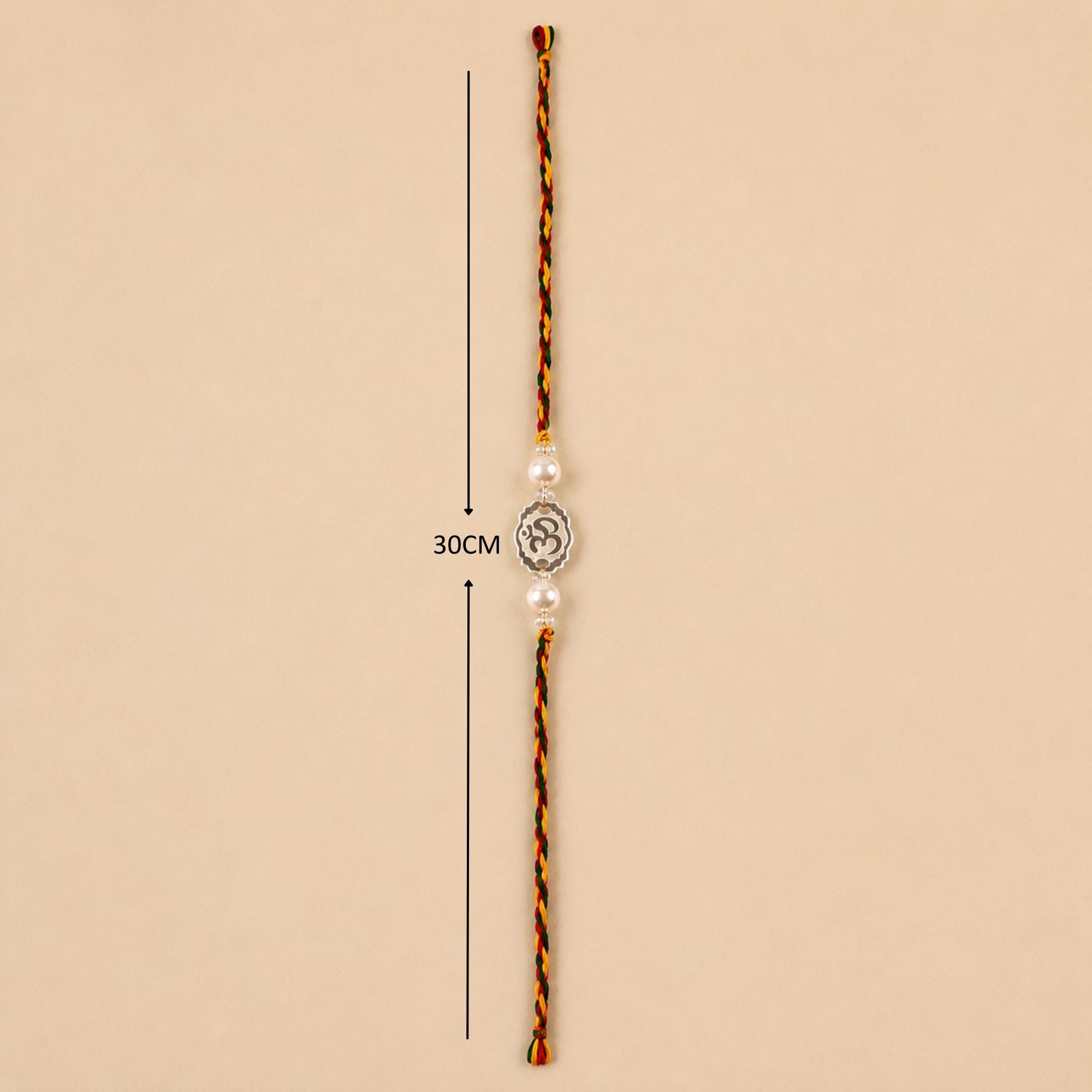 Full length layout showing thread length and dimensions of 925 silver Om oval pearl rakhi