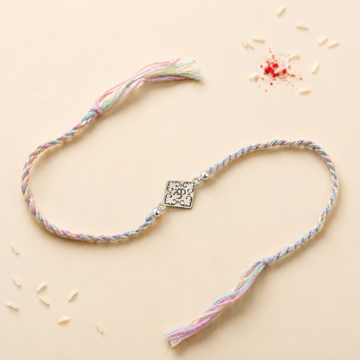 925 pure silver square filigree floral openwork charm rakhi with pearl beads on pastel multi color thread