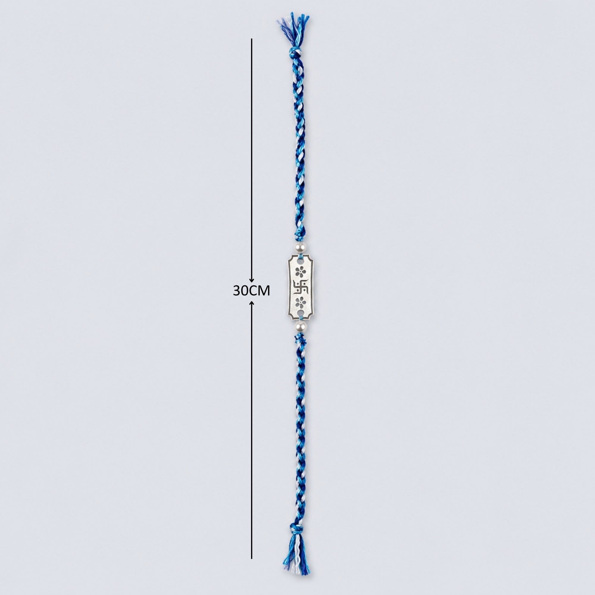 Full length layout showing thread length and dimensions of 925 silver Swastik floral engraved pearl rakhi on blue cord