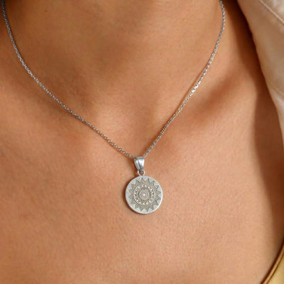 Model wearing 925 sterling silver divine Chakra disc pendant for men and women