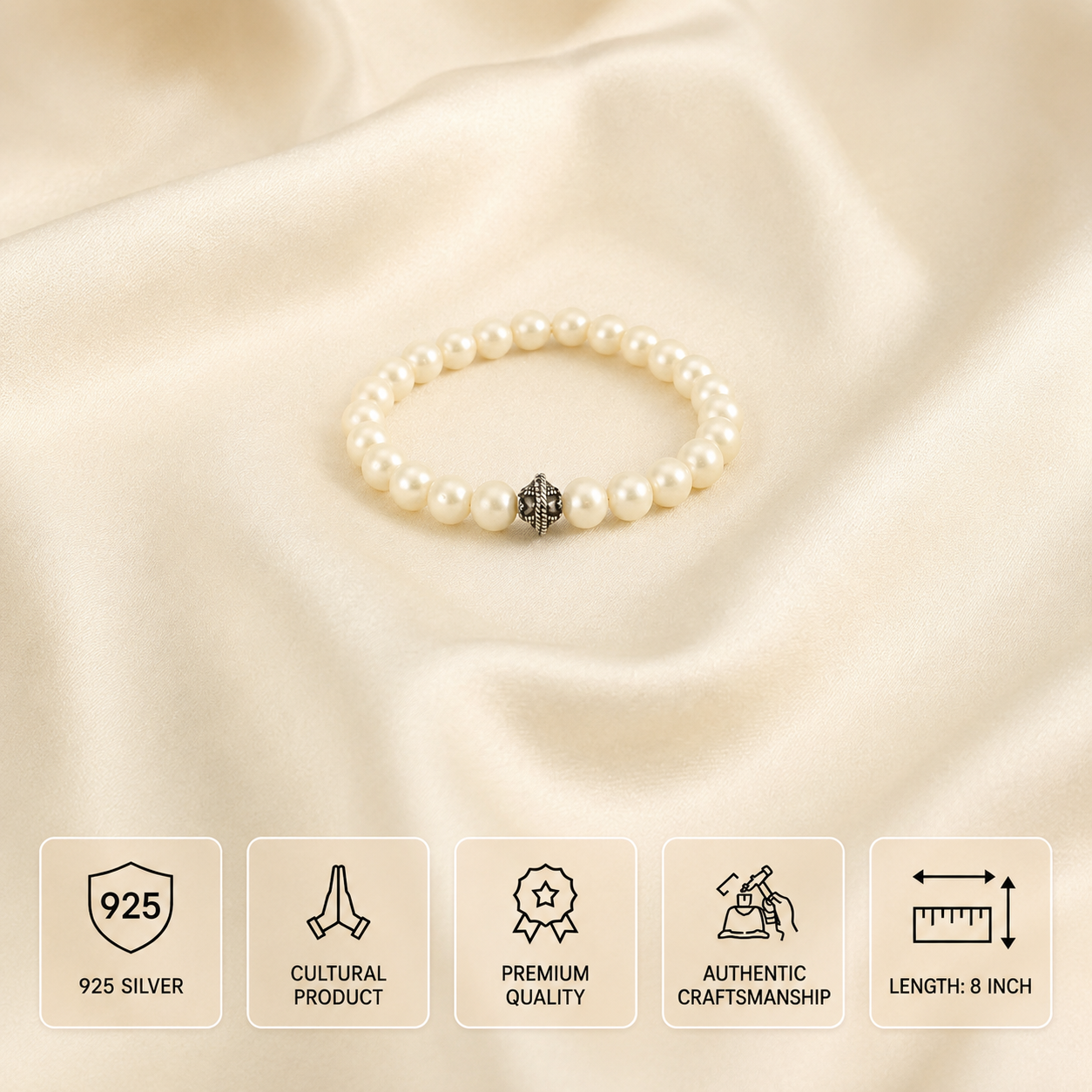 A pearl beaded bracelet with a silver-toned decorative center charm, displayed on draped cream satin fabric. Below the bracelet are five informational panels with icons and text reading 925 SILVER, CULTURAL PRODUCT, PREMIUM QUALITY, AUTHENTIC CRAFTSMANSHIP, and LENGTH: 8 INCH.