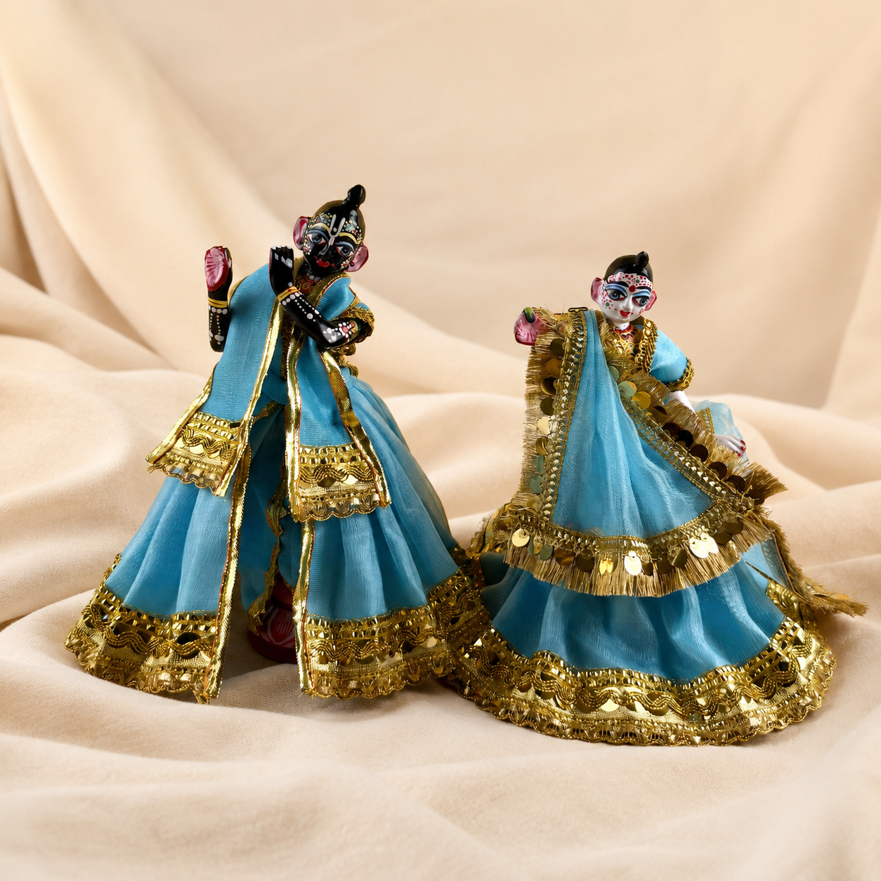 Designer Radha Krishna Poshak in sky blue and gold dress front product view