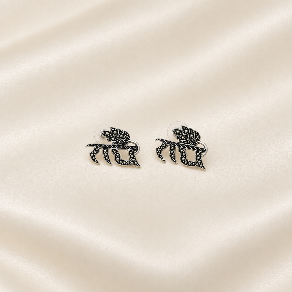 Radhe Oxidized Metal Earrings – Intricate Leaf Design