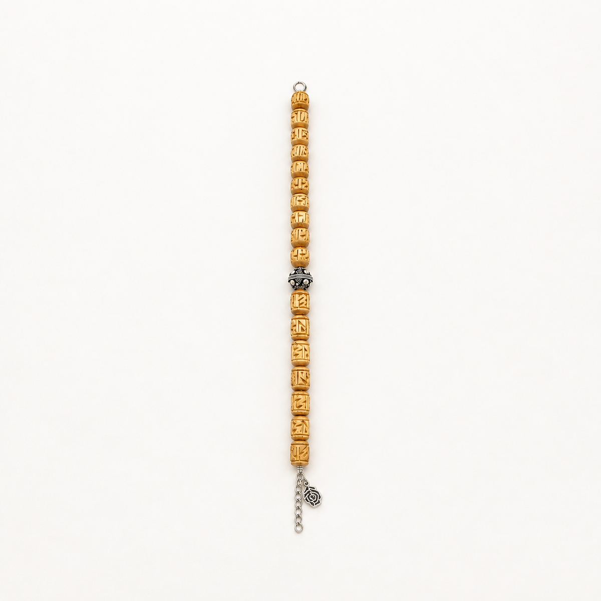 Handcrafted carved wooden bead strand with a silver centerpiece, top loop and floral charm