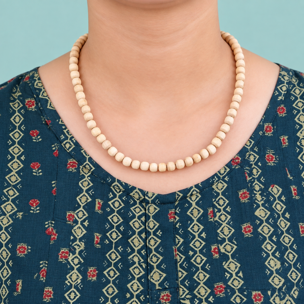 Handcrafted natural wooden bead necklace with evenly sized cream beads