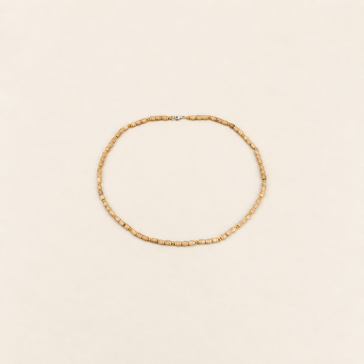 Handcrafted Tulsi mala with natural light wooden beads, gold spacer beads and silver clasp