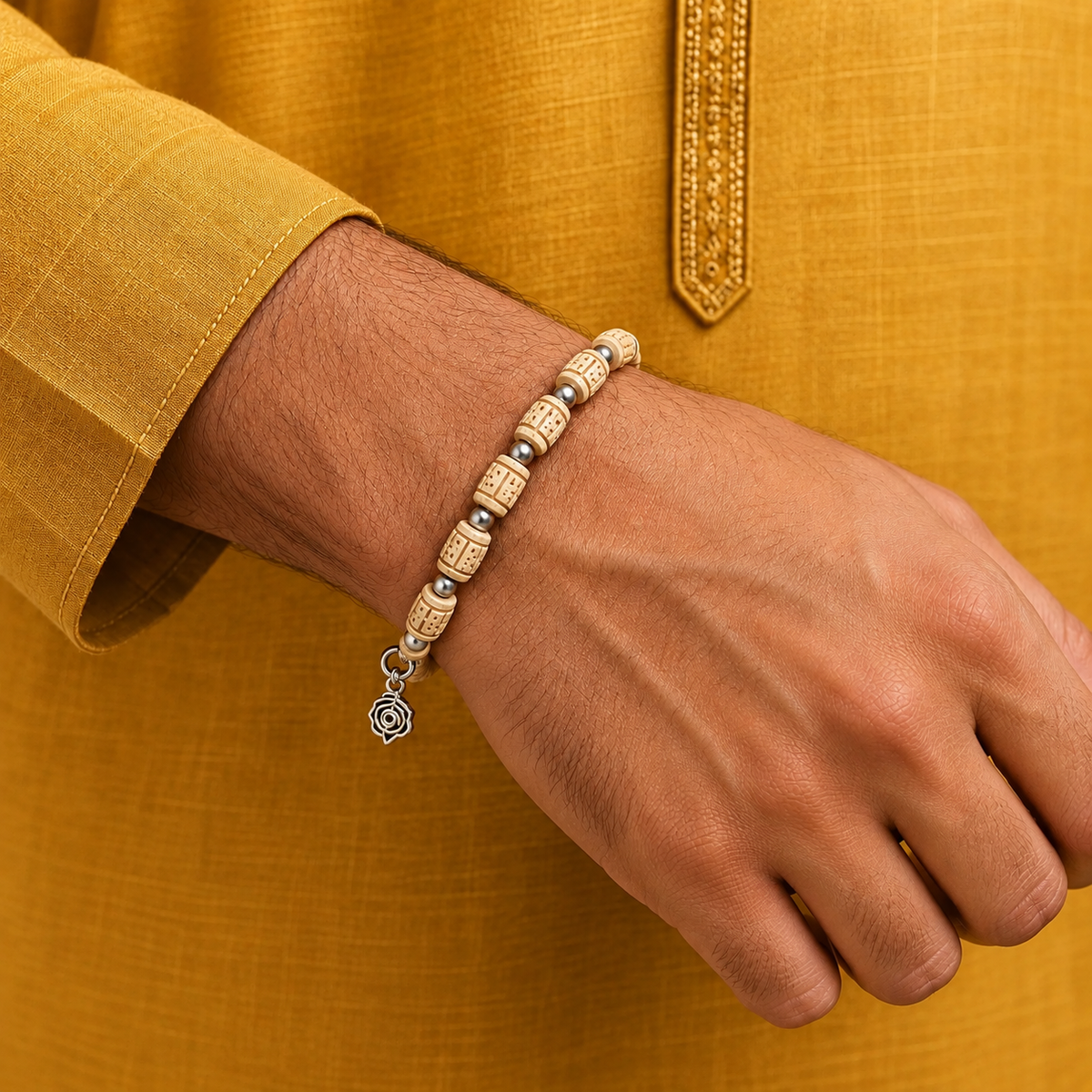 Handcrafted wooden bead bracelet with silver spacers