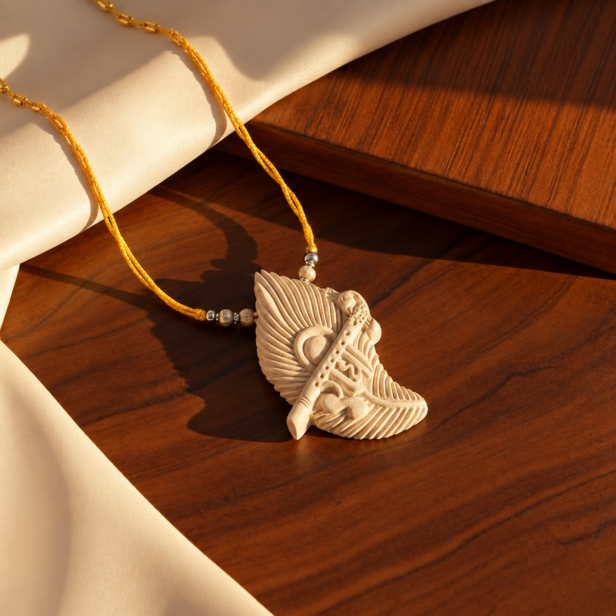 Handcrafted wooden Krishna flute pendant necklace with carved feather detailing
