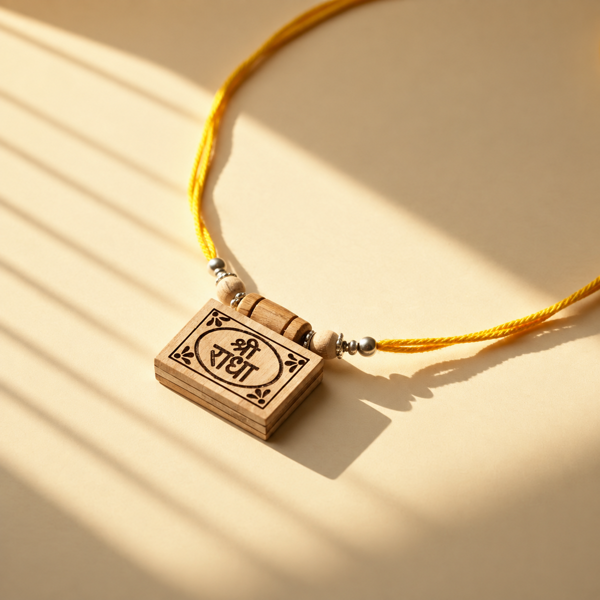 Handcrafted wooden Shri Radha pendant with engraved detailing.