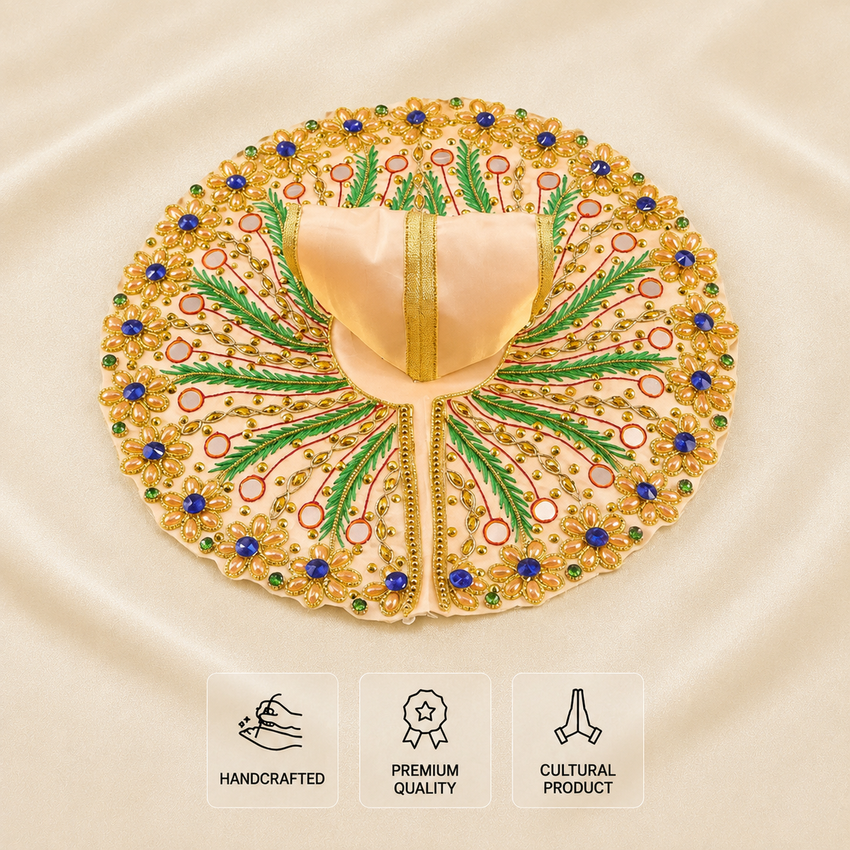 An ornate circular embroidered poshak laid flat on a cream satin background, featuring gold embroidery, green leaf motifs, blue and red jewel accents, and a pale center panel. Three small icon callouts at the bottom read Handcrafted, Premium Quality, and Cultural Product.