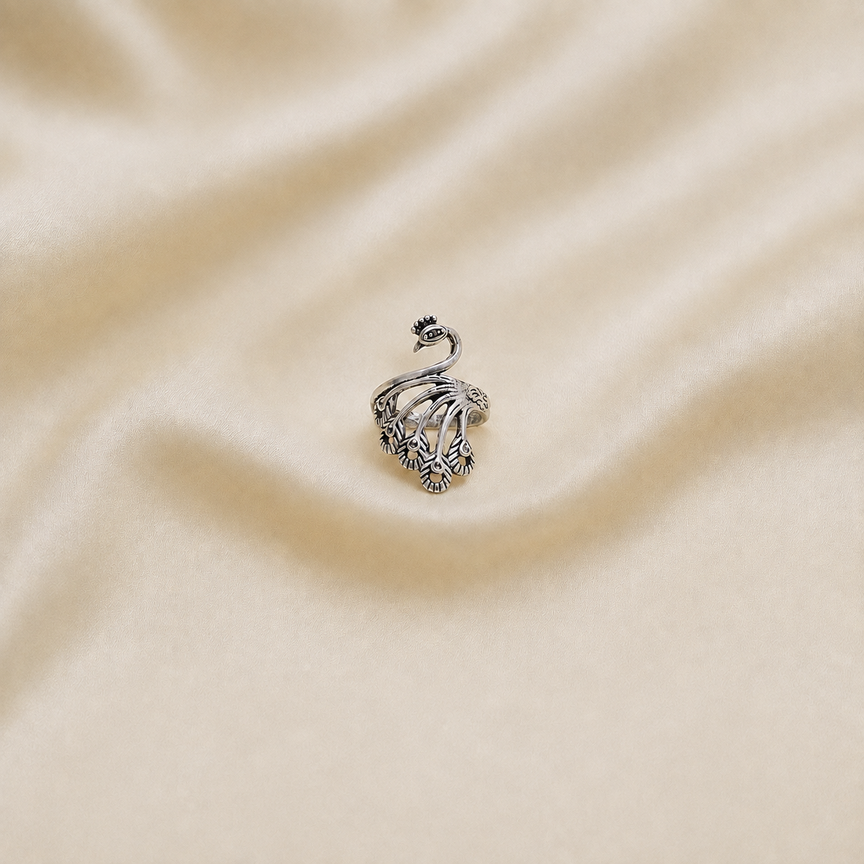 Handmade oxidized metal peacock ring layout showing 