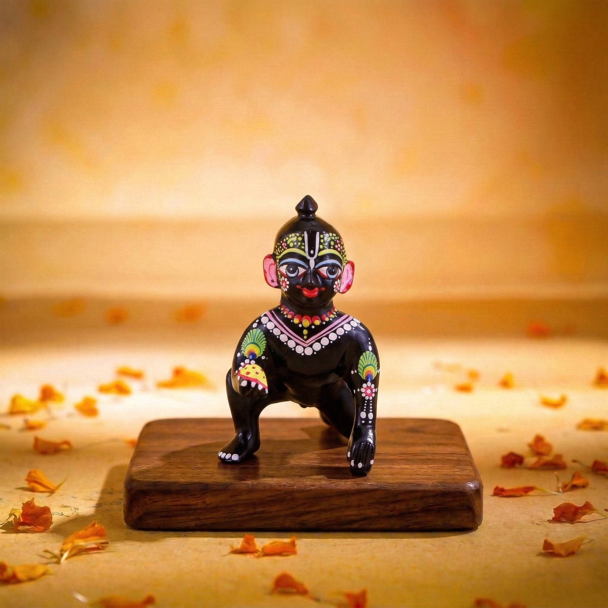 Deepen your devotion to mere krishna with our hand-painted black colour Laddu Gopal brass idol. Unique design pital murti handcrafted online.