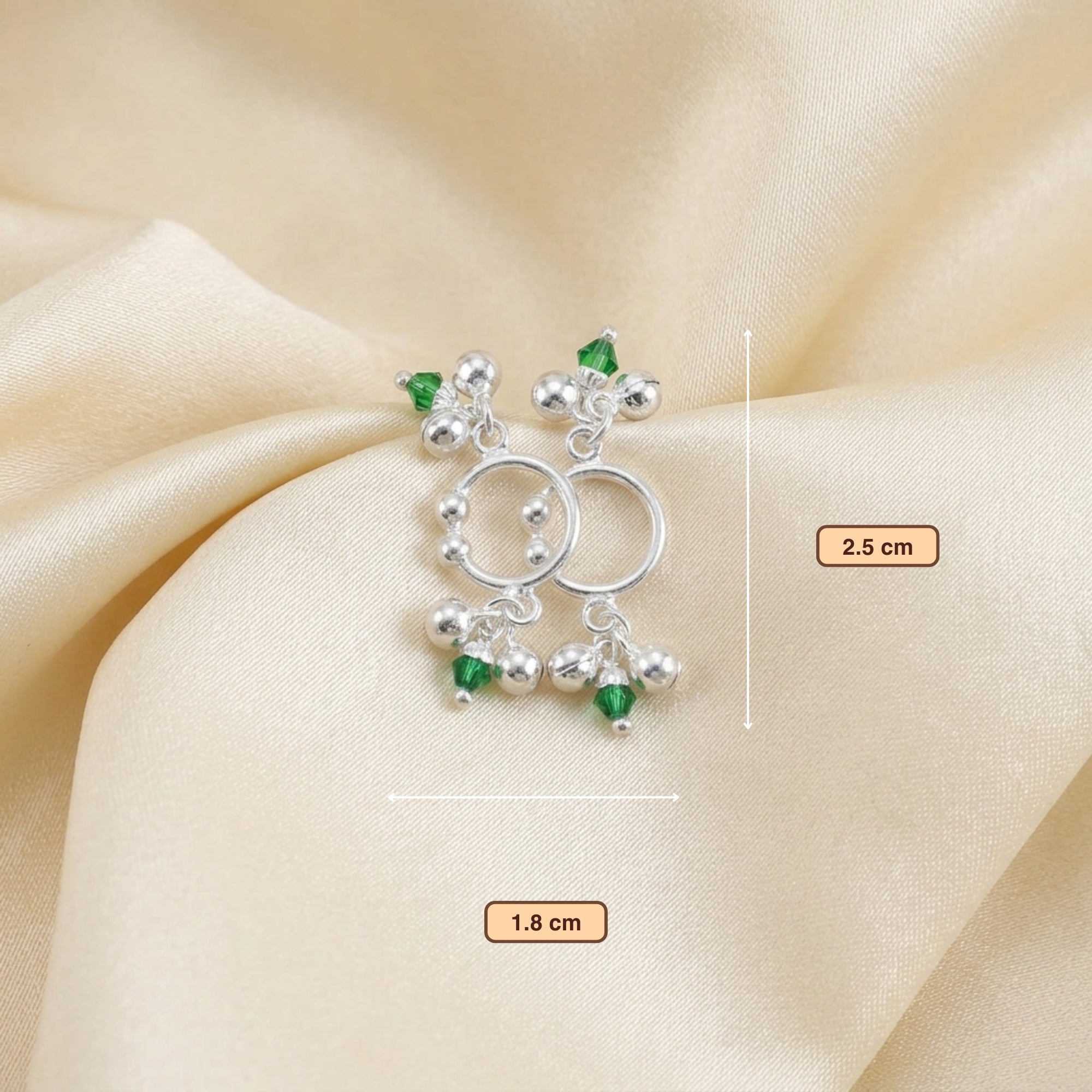 Layout showing pairs of pure silver green Meenakari ghungroo payal anklets for Laddu Gopal