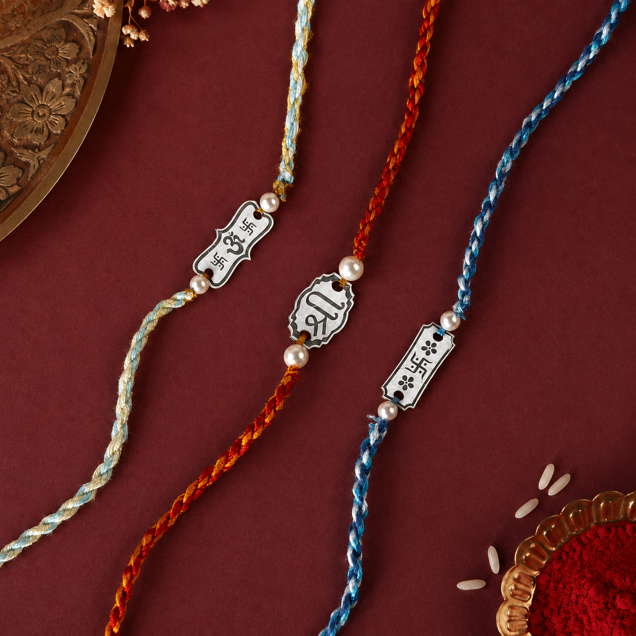 Set of 3 silver rakhis for brothers with pearl beads and colourful braided threads