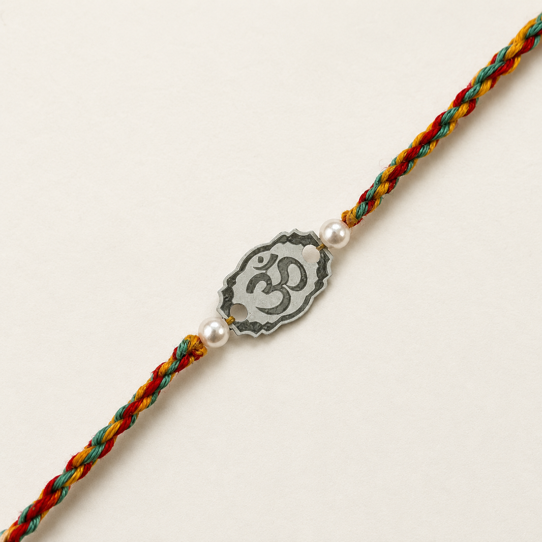 Handcrafted Silver Om Rakhi Online – Traditional Raksha Bandhan Thread