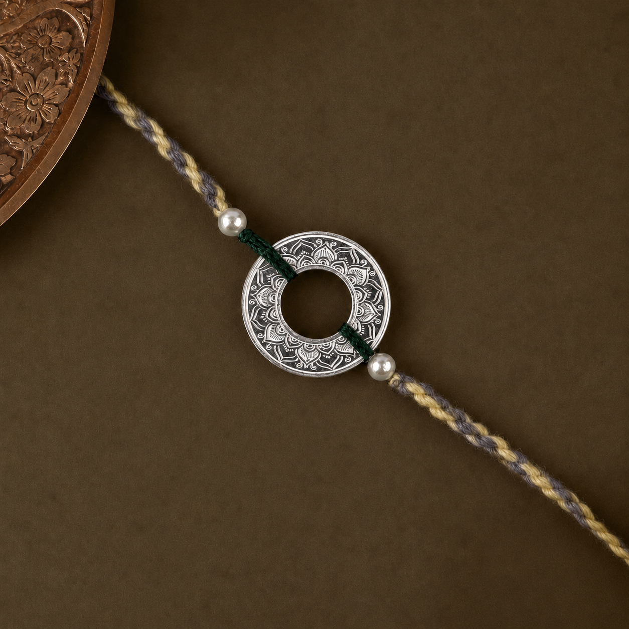 Handcrafted Silver Rakhi close-up view