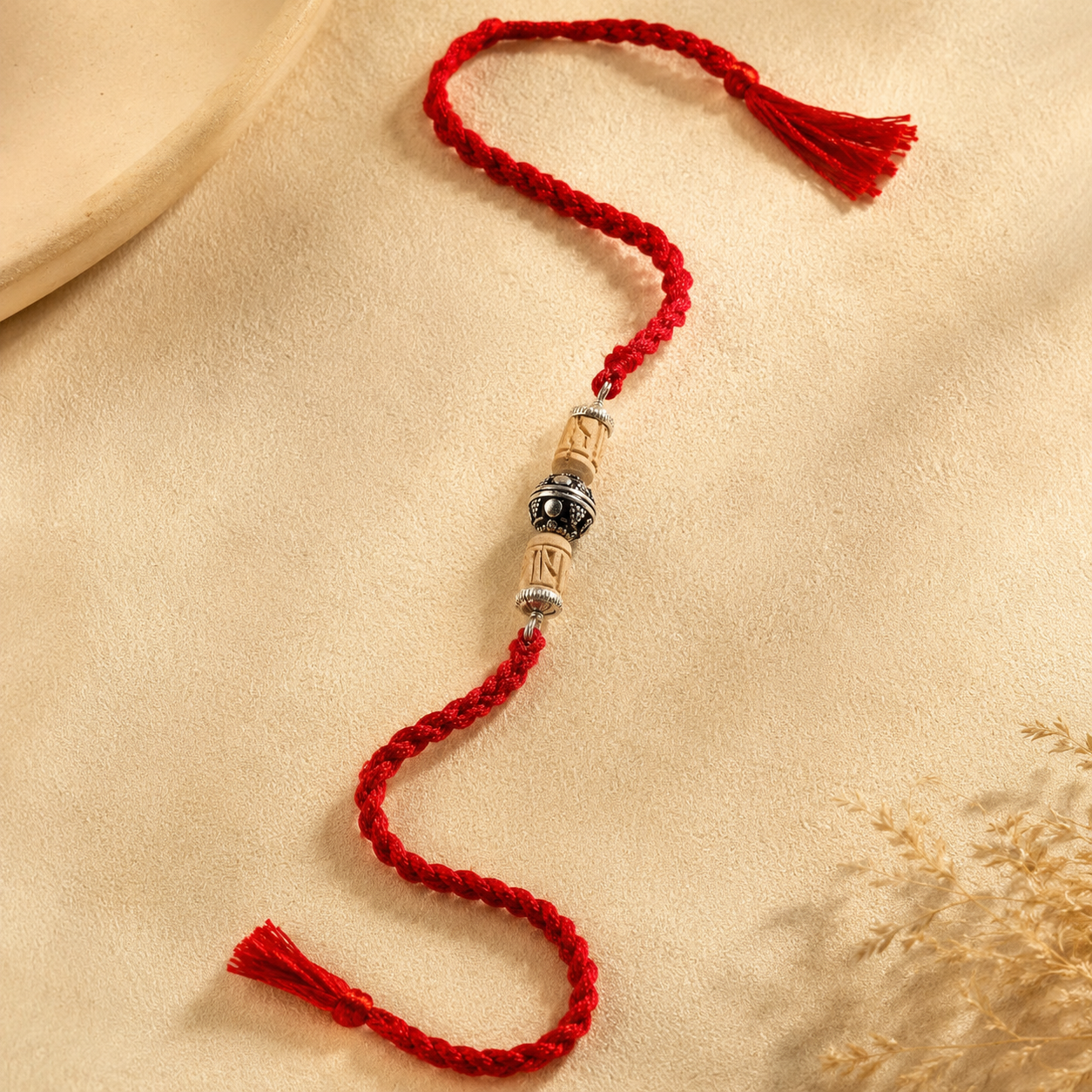 925 silver Tulsi Rakhi for brother with red Mauli thread front view