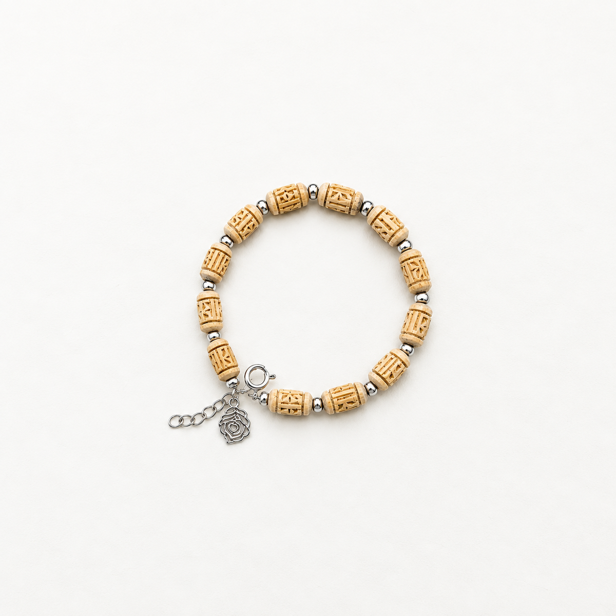 Handcrafted carved wooden bead bracelet with silver spacers, adjustable chain and Feather charm