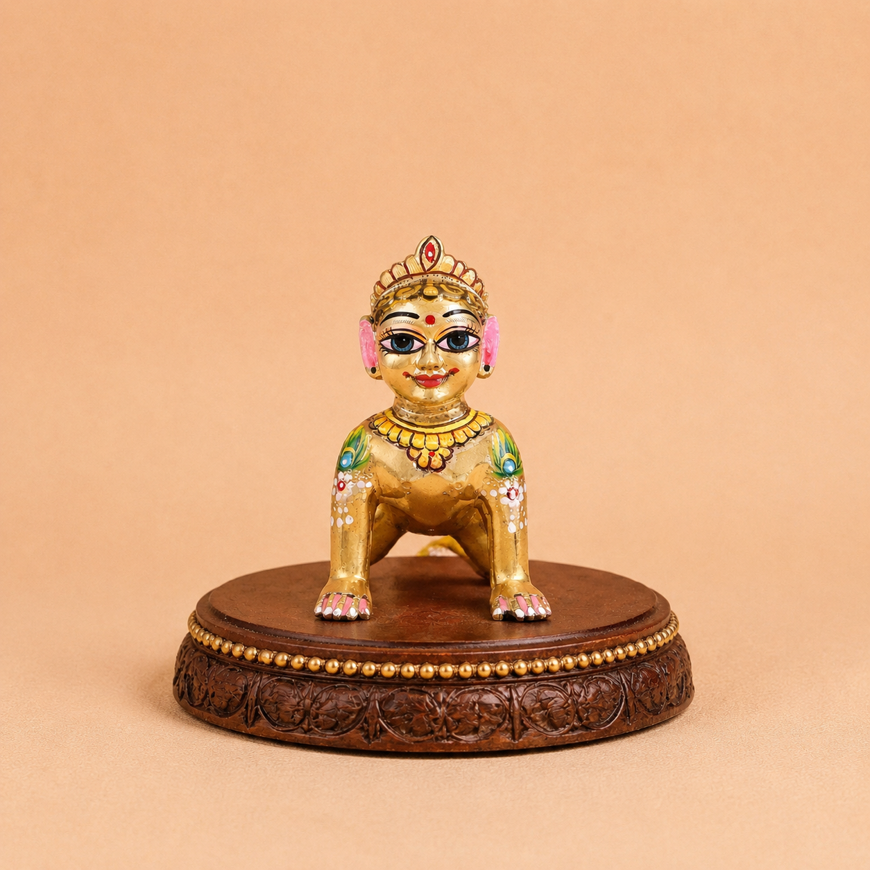 Hand-painted golden Ashtadhatu Radha Rani idol