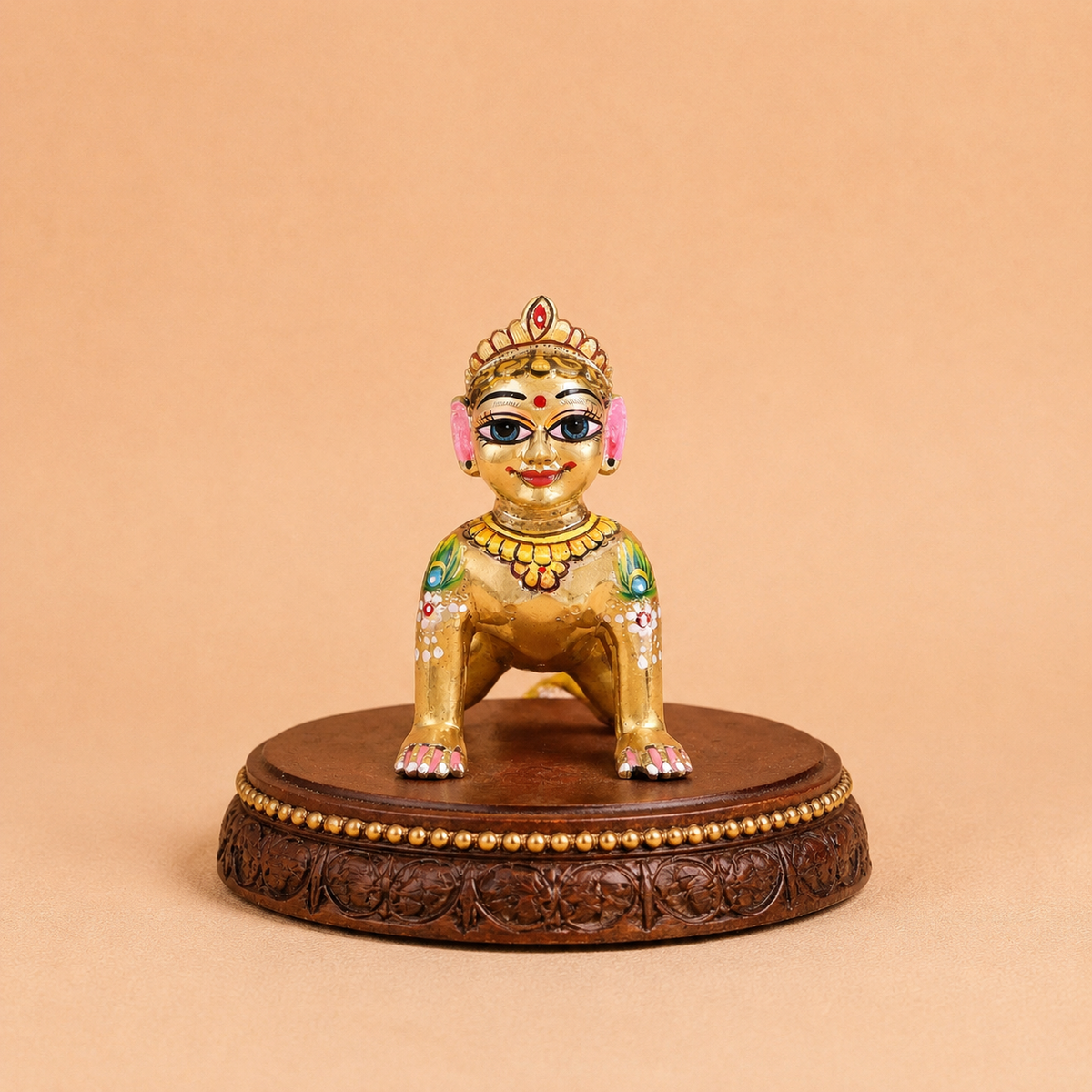Hand-painted golden Ashtadhatu Radha Rani idol