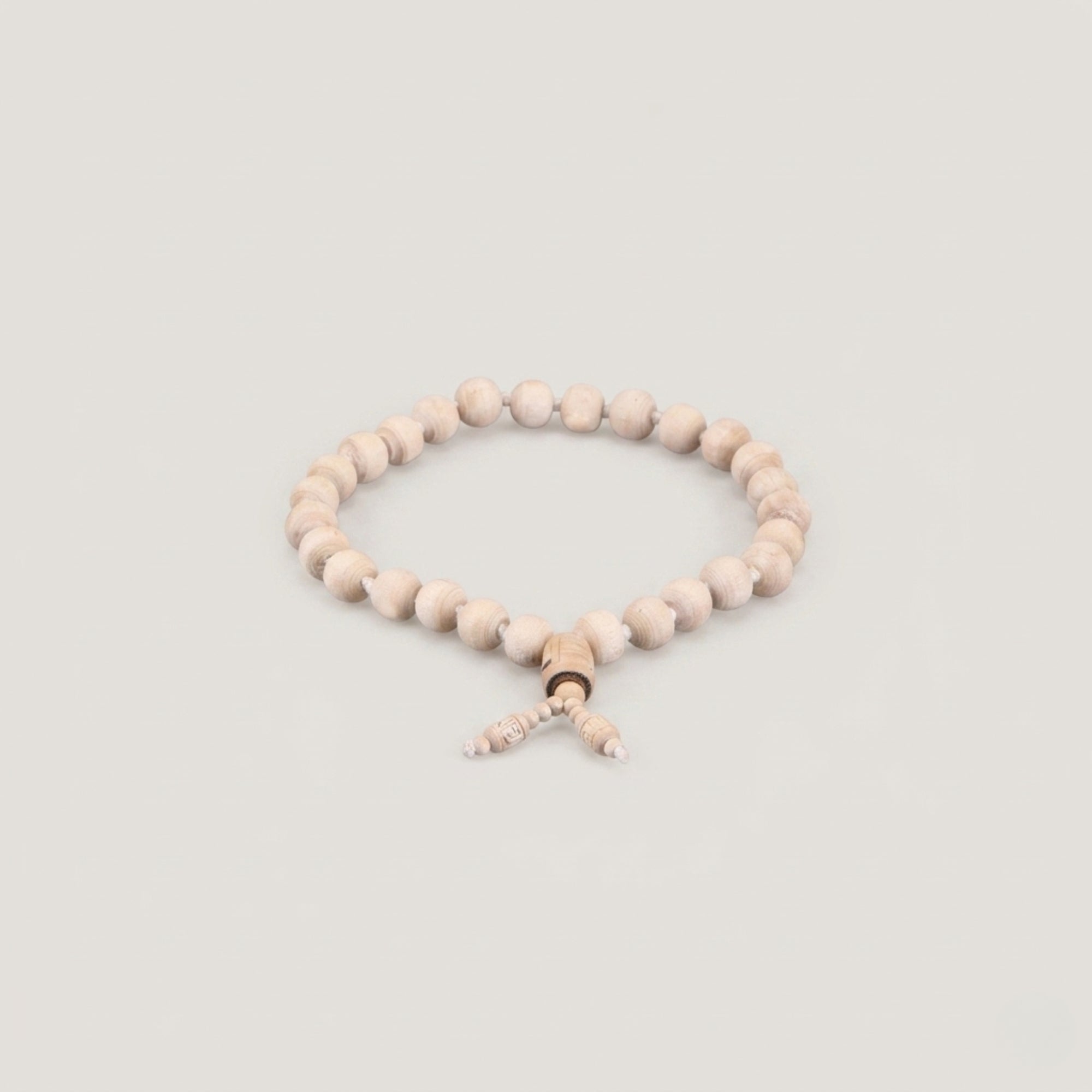 Close up of a pure Vrindavan Tulsi japa mala featuring smooth round chanting beads