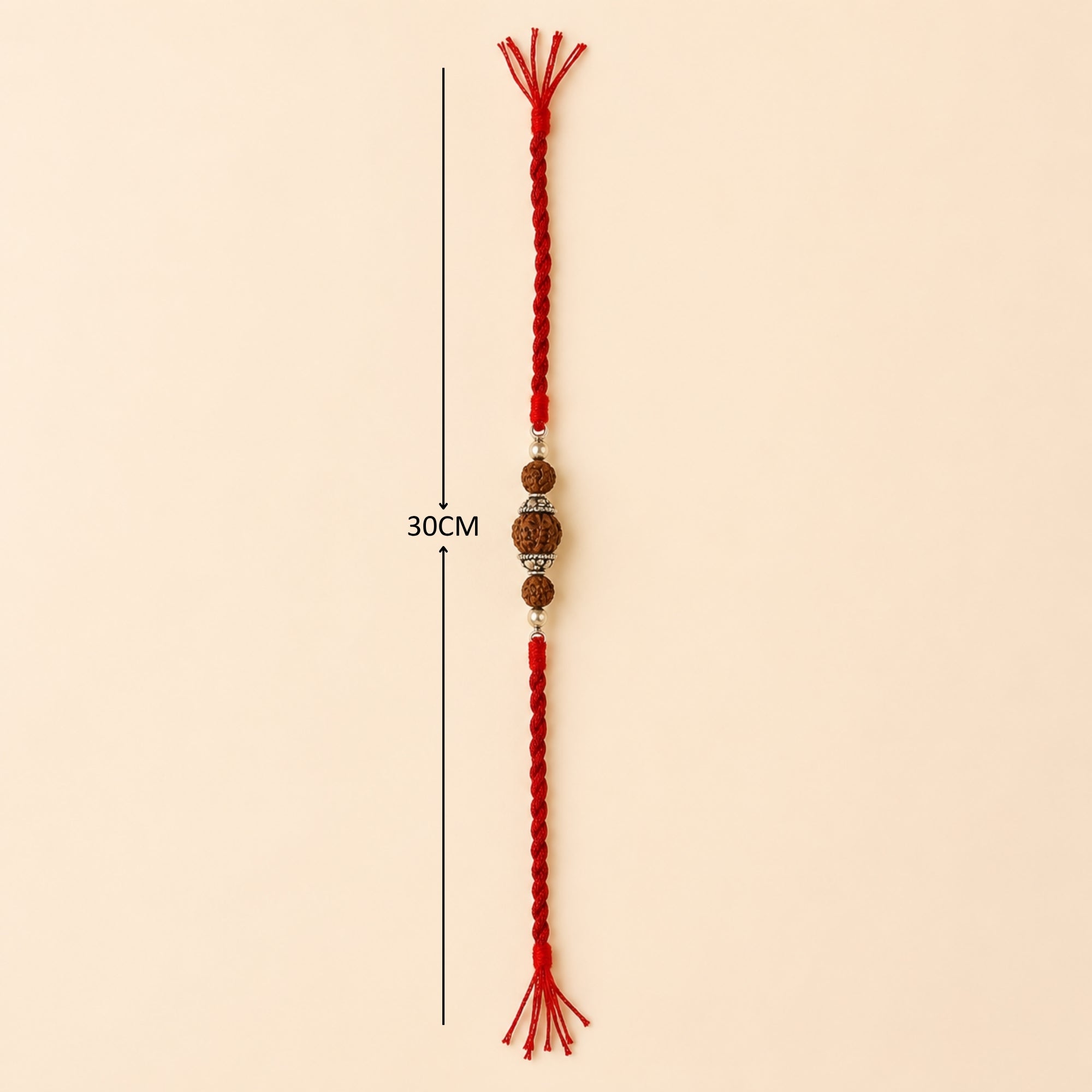 Full length layout showing red thread length and dimensions of 925 silver Rudraksha rakhi