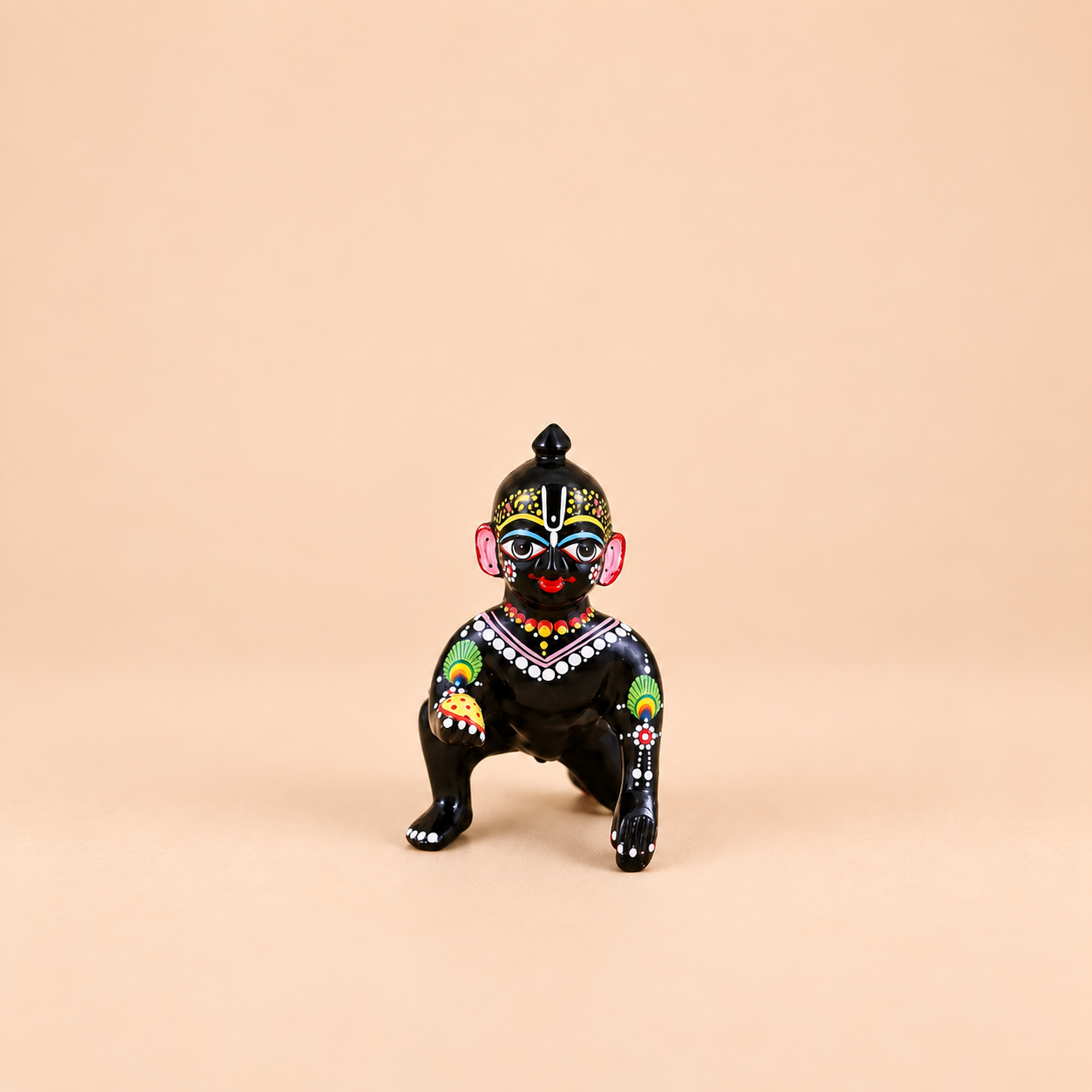 Laddu Gopal idol featuring front photo