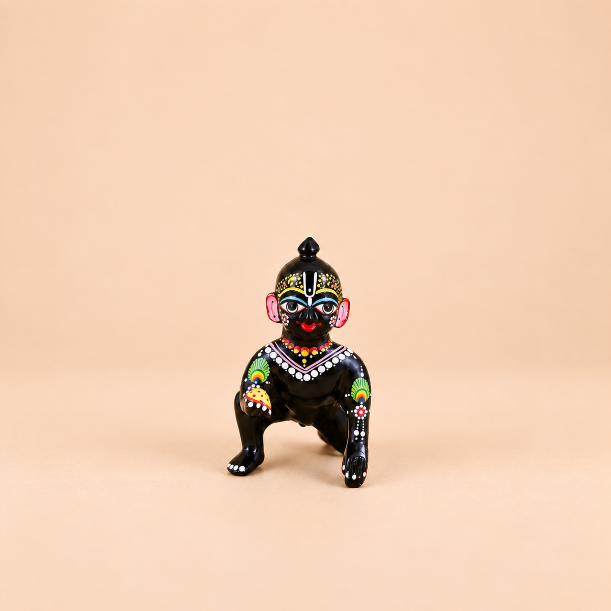 Laddu Gopal idol featuring front photo
