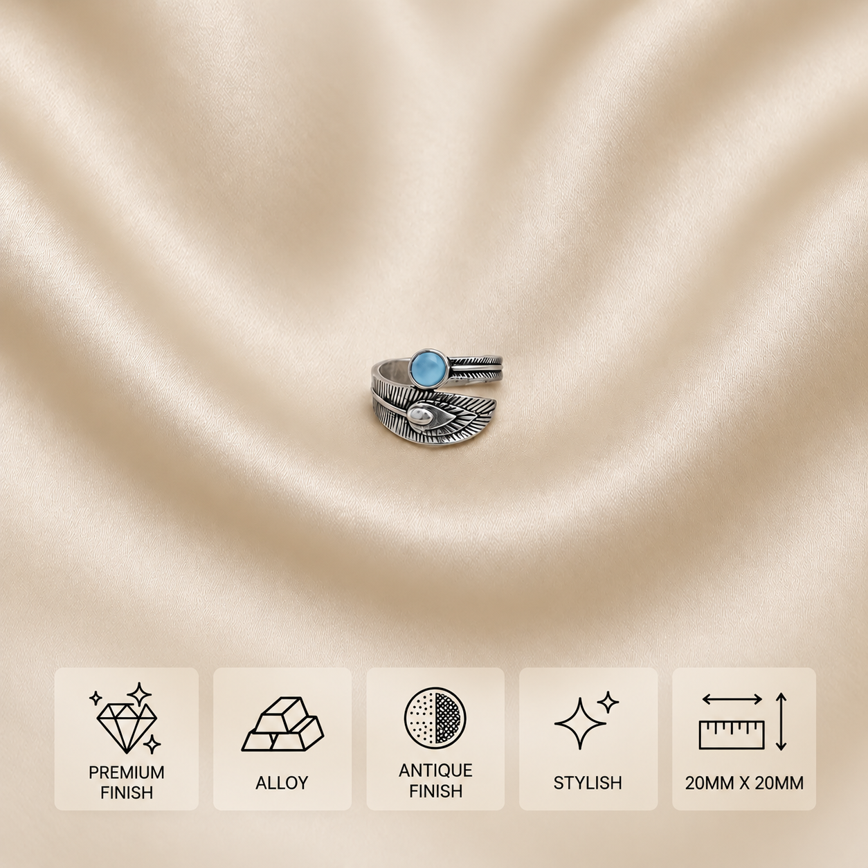 Antique-finish feather alloy ring with a blue stone, measuring 20 × 20 mm.