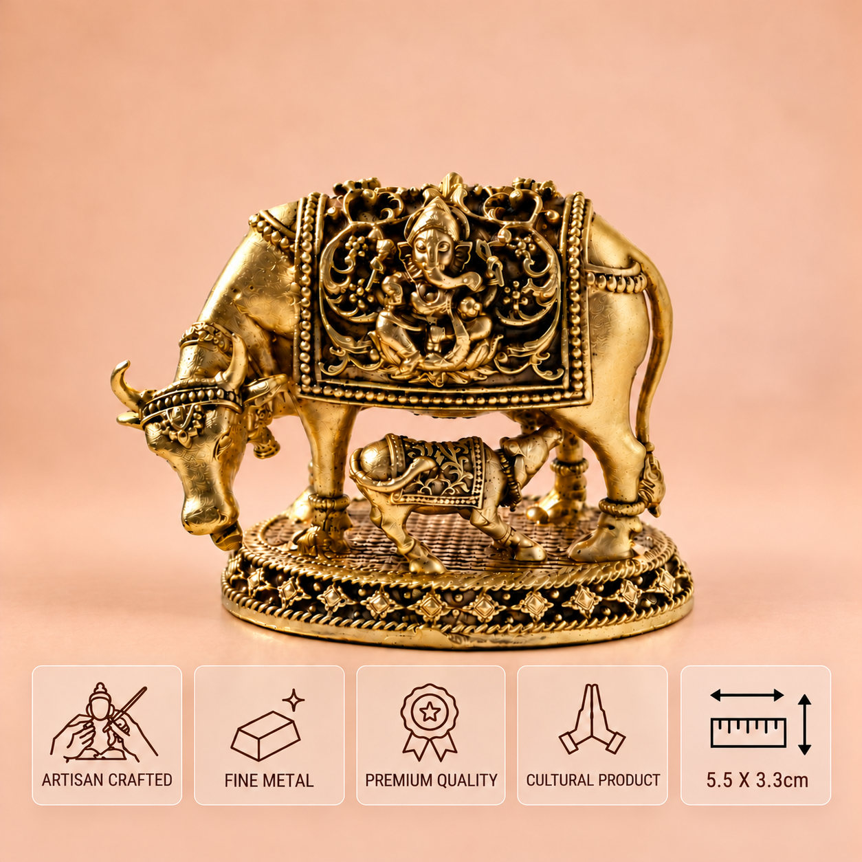 Golden brass Kamdhenu cow and calf statue with Ganesha relief on a peach background, with glass feature cards.