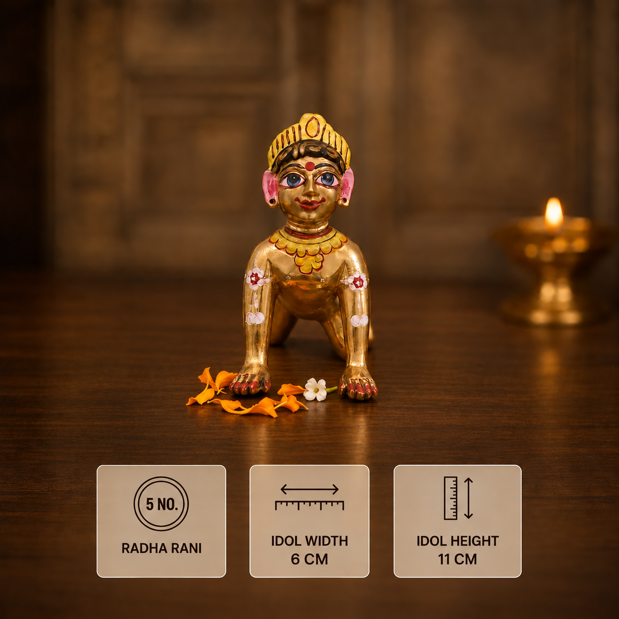 Brass Radha Rani idol (Size 5 No.) with hand-painted details, measuring 11 cm in height and 6 cm in width on a dark wooden background with a diya.