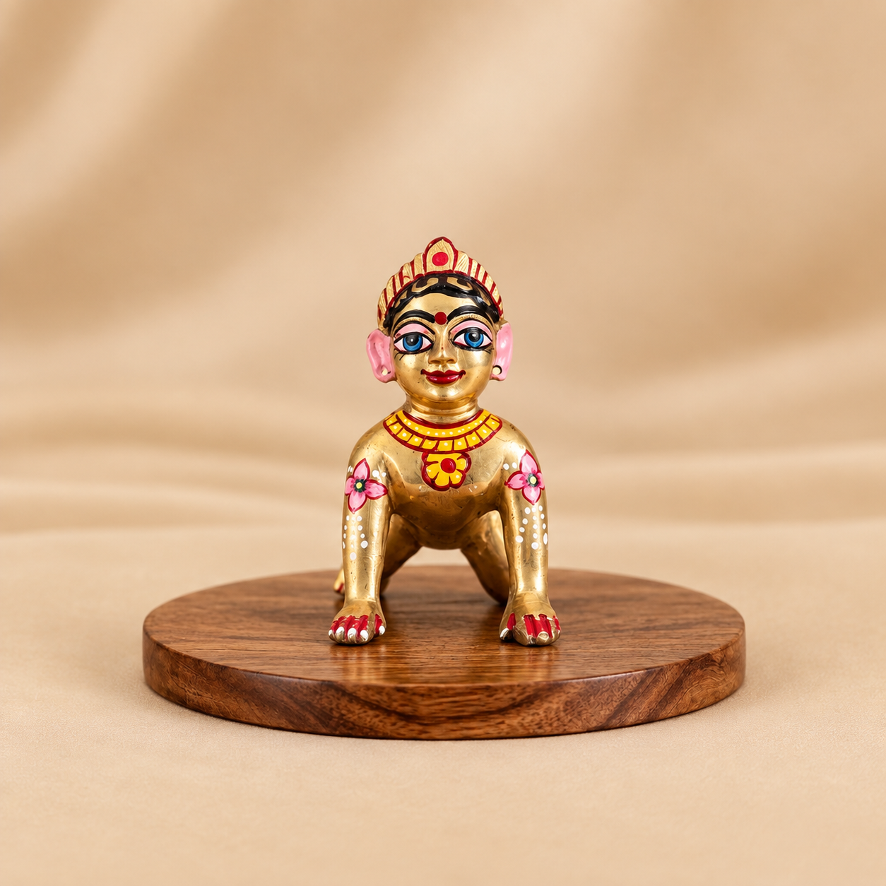 Hand-painted golden Ashtadhatu Radha Rani idol 