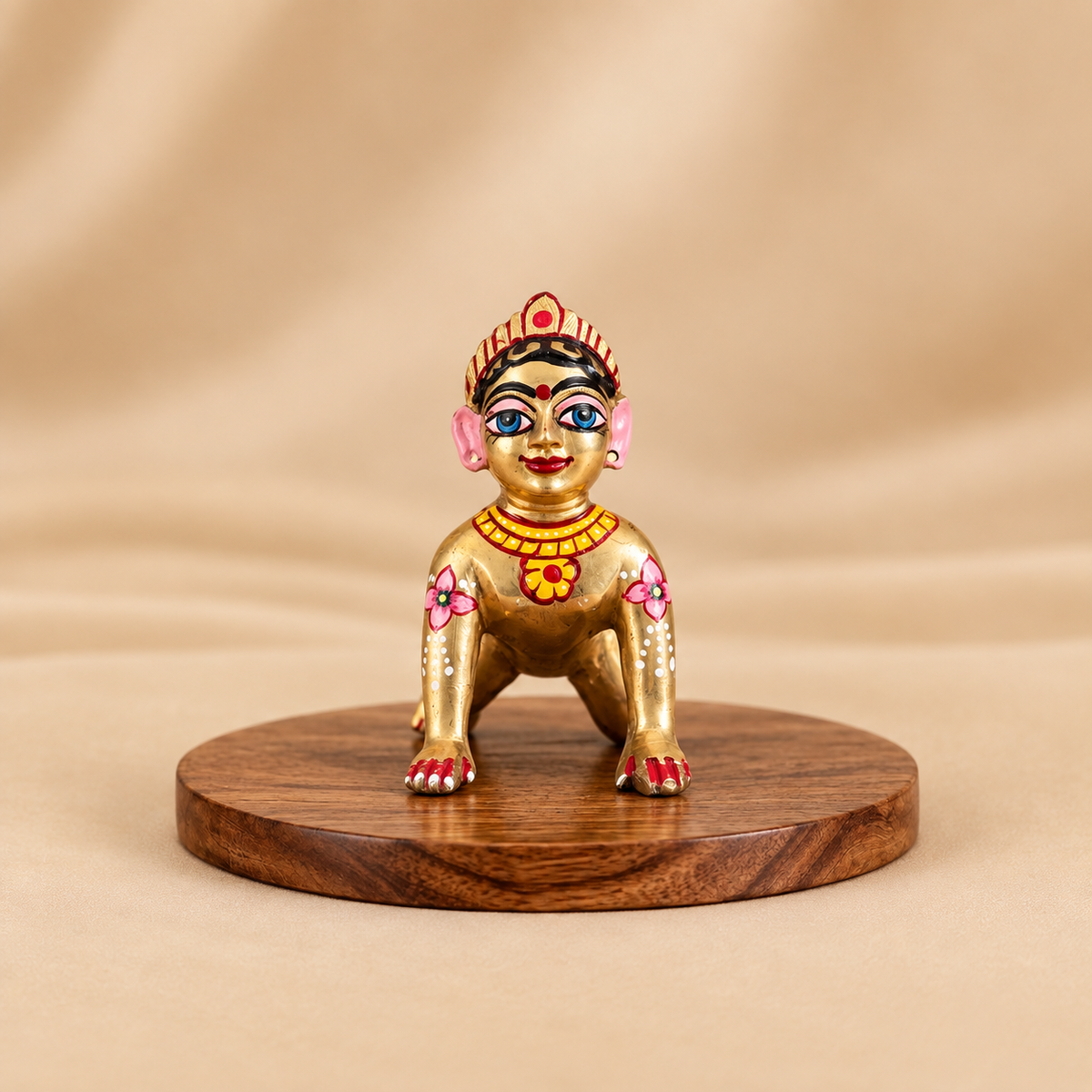 Hand-painted golden Ashtadhatu Radha Rani idol 