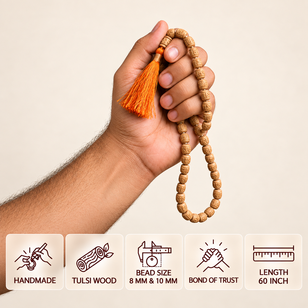 Hand holding a carved Tulsi japa mala with an orange tassel against an off-white background, with feature cards showing 8 mm and 10 mm beads and 60 inch length.