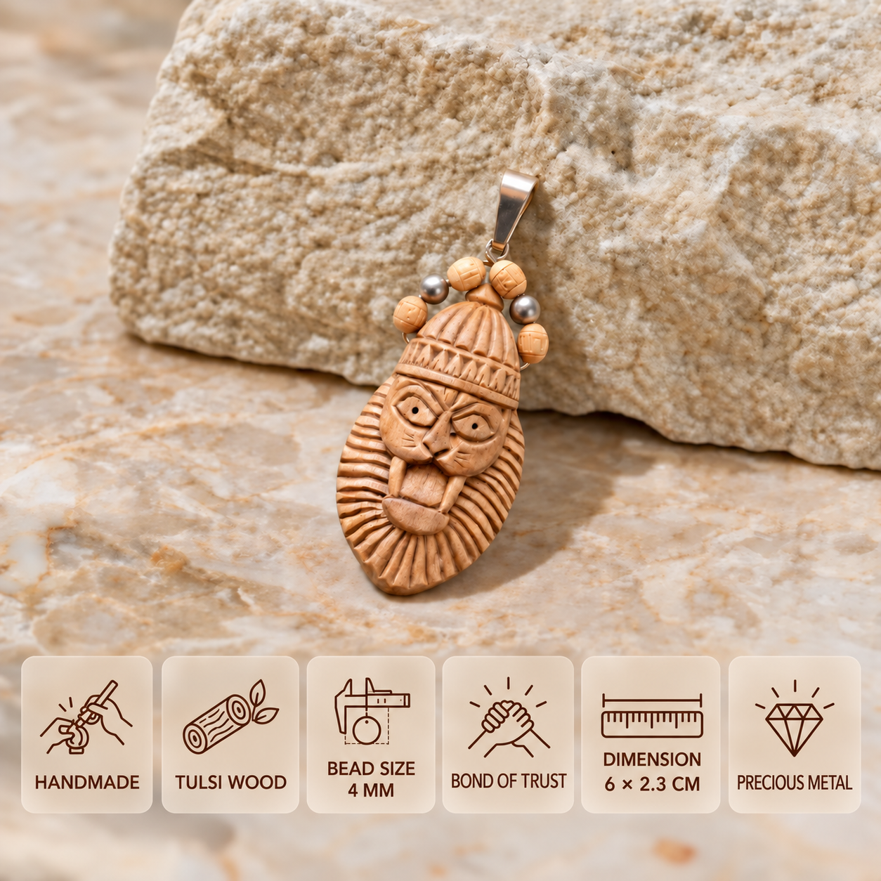 Carved Tulsi wood lion-face pendant with silver-toned fittings and 4 mm beads, measuring 6 × 2.3 cm.