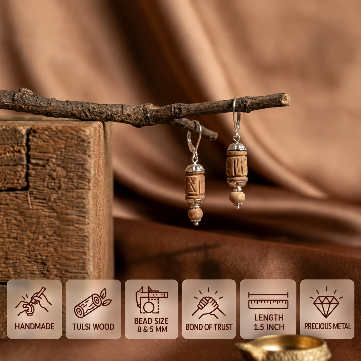 Carved Tulsi wood earrings with silver fittings hanging from a branch, showing 8 mm and 5 mm bead sizes.