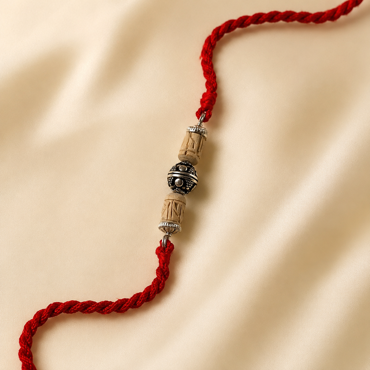 Close up view of 925 sterling silver filigree capped Tulsi bead with silver accent spacers
