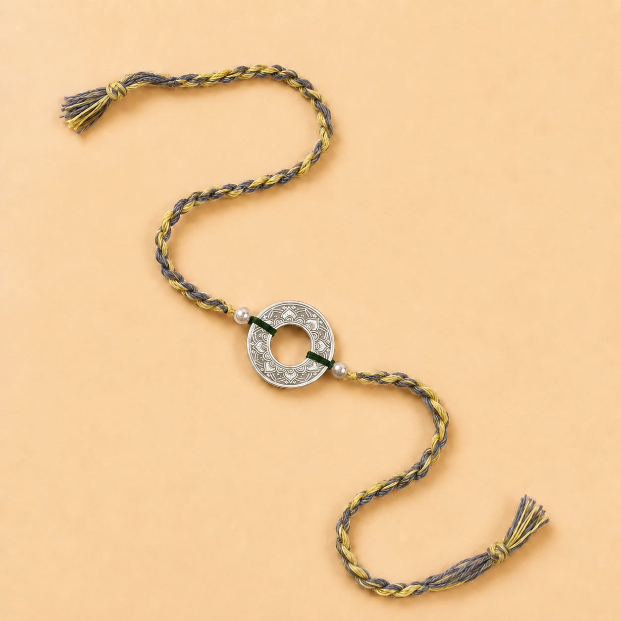 Close up view of intricate filigree open wheel charm in 925 sterling silver