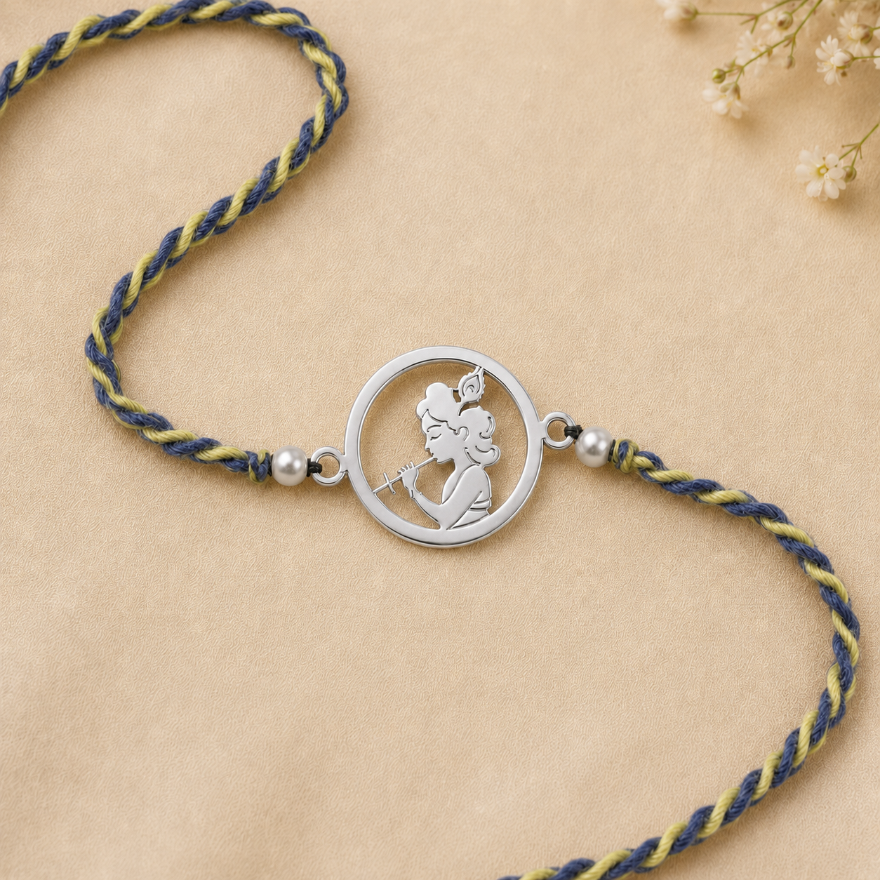 Close up view of 925 sterling silver circular charm depicting Lord Krishna playing flute with pearls